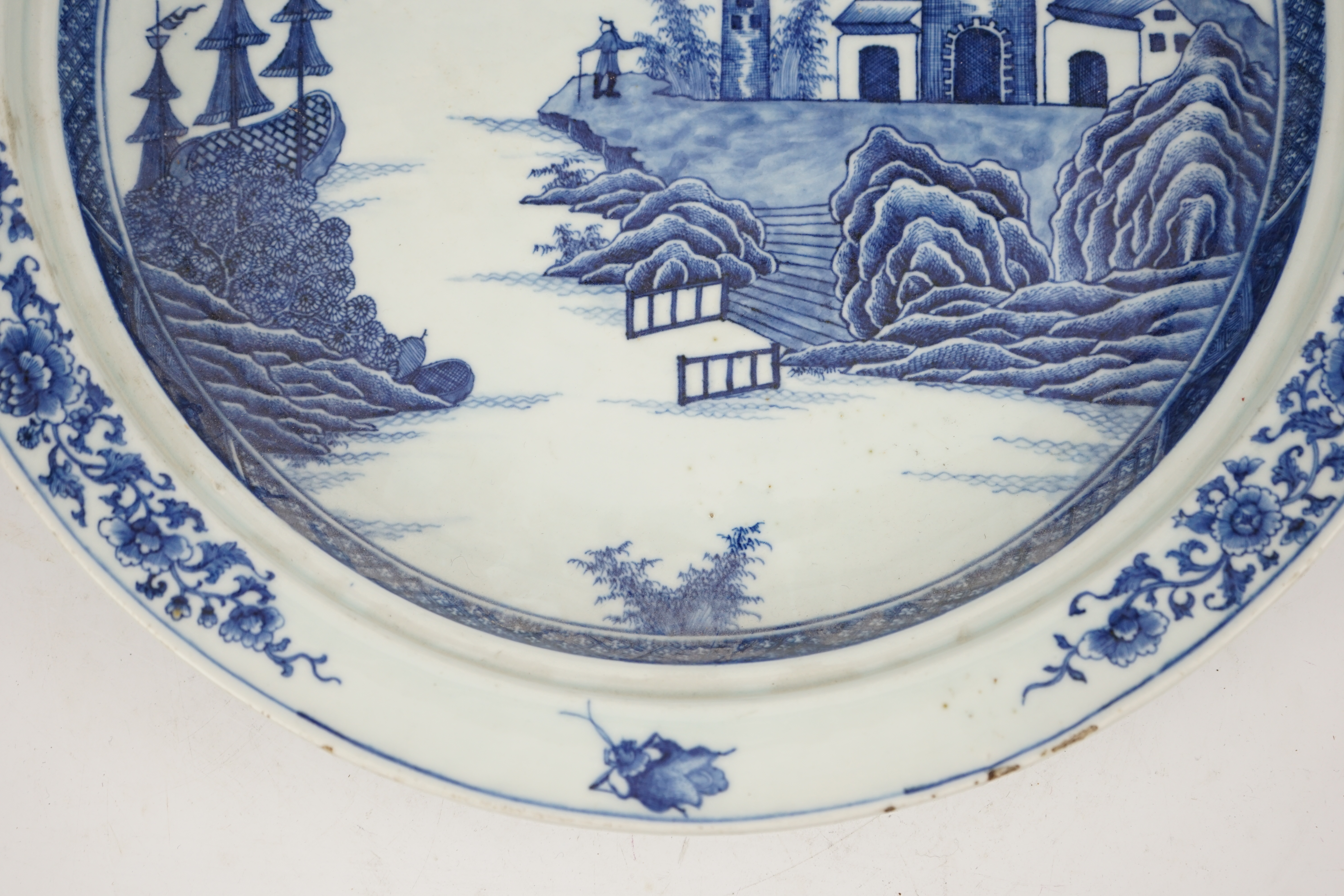 An unusual Chinese European subject blue and white shallow basin, Qianlong period